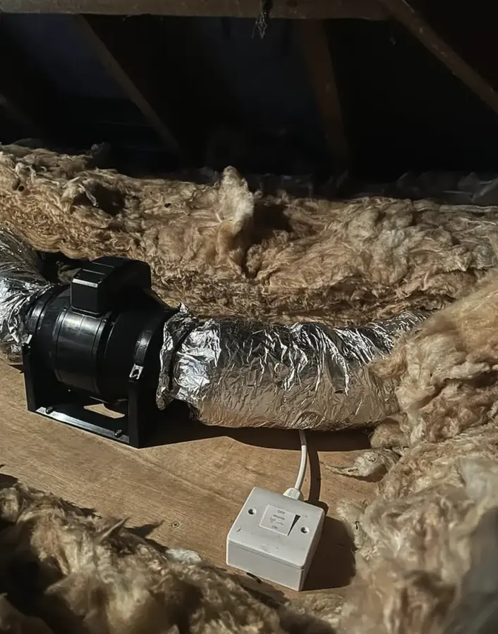Extract ducting and a fused spur wired in a loft