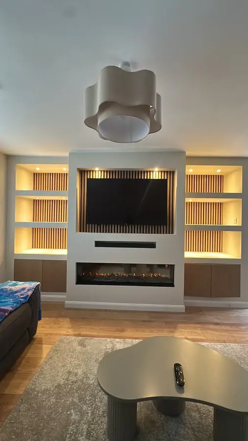 A media wall with LED shelving