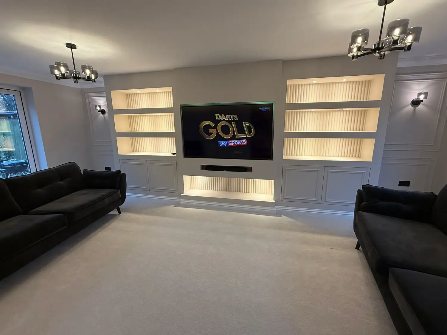 A lit media wall in a Lincoln home